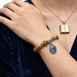 Our Lady of Mary Pendant Royal Blue Pearl Rosary Bracelet: A Wrist-Worn Reminder of Grace - product view