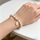 Cross Charm Beaded Stretch Bracelet – Faith, Hope & Timeless Devotion