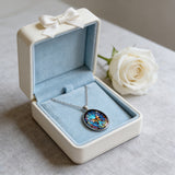 Stained Glass Butterfly Oval Pendant Necklace: A Symbol of Transformation and Radiance