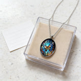 Stained Glass Butterfly Oval Pendant Necklace: A Symbol of Transformation and Radiance