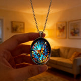 Stained Glass Butterfly Oval Pendant Necklace: A Symbol of Transformation and Radiance