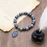 Our Lady of Mary Pendant Royal Blue Pearl Rosary Bracelet: A Wrist-Worn Reminder of Grace - side view