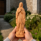 Round carving of Our Lady of Lourdes in beech wood: Sacred beauty, handcrafted technique