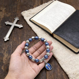 Our Lady of Mary Pendant Royal Blue Pearl Rosary Bracelet: A Wrist-Worn Reminder of Grace - side view