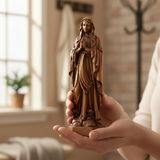 Wooden statue of Our Lady of Lourdes praying