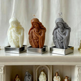 Virgin Mary holding the infant Jesus craft candle