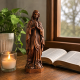 Wooden statue of Our Lady of Lourdes praying