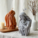 Virgin Mary holding the infant Jesus craft candle