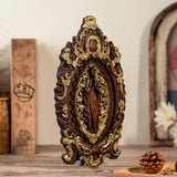 Wood carving of the Virgin Mary in leaves - BGCOPPER