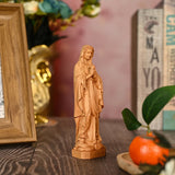 Round carving of Our Lady of Lourdes in beech wood: Sacred beauty, handcrafted technique - BGCOPPER