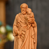 Beechwood roundel of Joseph holding a child: sacred heritage, warmth and eternity - BGCOPPER