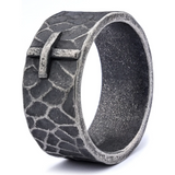 Hand-carved stone cross ring carries His gentle protection