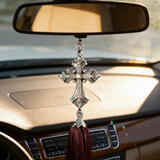 Crystal cross hanging in luxury car