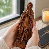 Wooden statue of Our Lady of Lourdes praying