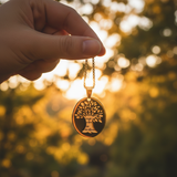 Hand holding chain - golden hour through leaves