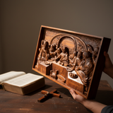 Hands with Bible nearby