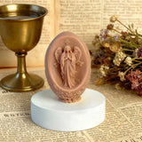 Oval Virgin Mary Scented Candle: A Sacred Blend of Devotion & Elegance