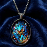 Stained Glass Butterfly Oval Pendant Necklace: A Symbol of Transformation and Radiance