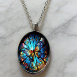 Stained Glass Butterfly Oval Pendant Necklace: A Symbol of Transformation and Radiance