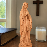 Round carving of Our Lady of Lourdes in beech wood: Sacred beauty, handcrafted technique