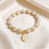 Cross Charm Beaded Stretch Bracelet – Faith, Hope & Timeless Devotion
