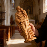 Beechwood roundel of Joseph holding a child: sacred heritage, warmth and eternity