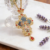 Gilded Leaf-Edged Jesus Crucifix Necklace: Elegance Woven with Faith