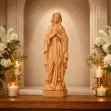 Round carving of Our Lady of Lourdes in beech wood: Sacred beauty, handcrafted technique
