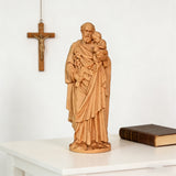 Beechwood roundel of Joseph holding a child: sacred heritage, warmth and eternity