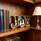 Layered JOY Nativity Wood Carving | Handcrafted Boxwood Christmas Faith Decor — A Testament of God’s Grace