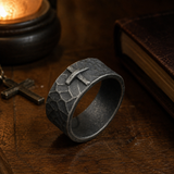 Hand-carved stone cross ring carries His gentle protection