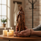 Wooden statue of Our Lady of Lourdes praying