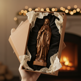 Wooden statue of Our Lady of Lourdes praying