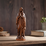 Wooden statue of Our Lady of Lourdes praying
