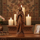 Wooden statue of Our Lady of Lourdes praying for Christian home display and prayer spaces
