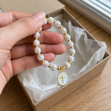 Black & Gold Cross Beaded Stretch Bracelet – A Daily Reminder of Faith, Hope & Devotion - side view