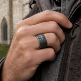 Hand-carved stone cross ring carries His gentle protection