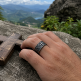 Hand-carved stone cross ring carries His gentle protection