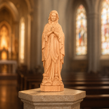 Round carving of Our Lady of Lourdes in beech wood: Sacred beauty, handcrafted technique