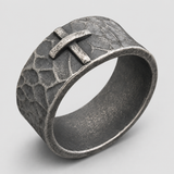 Hand-carved stone cross ring carries His gentle protection