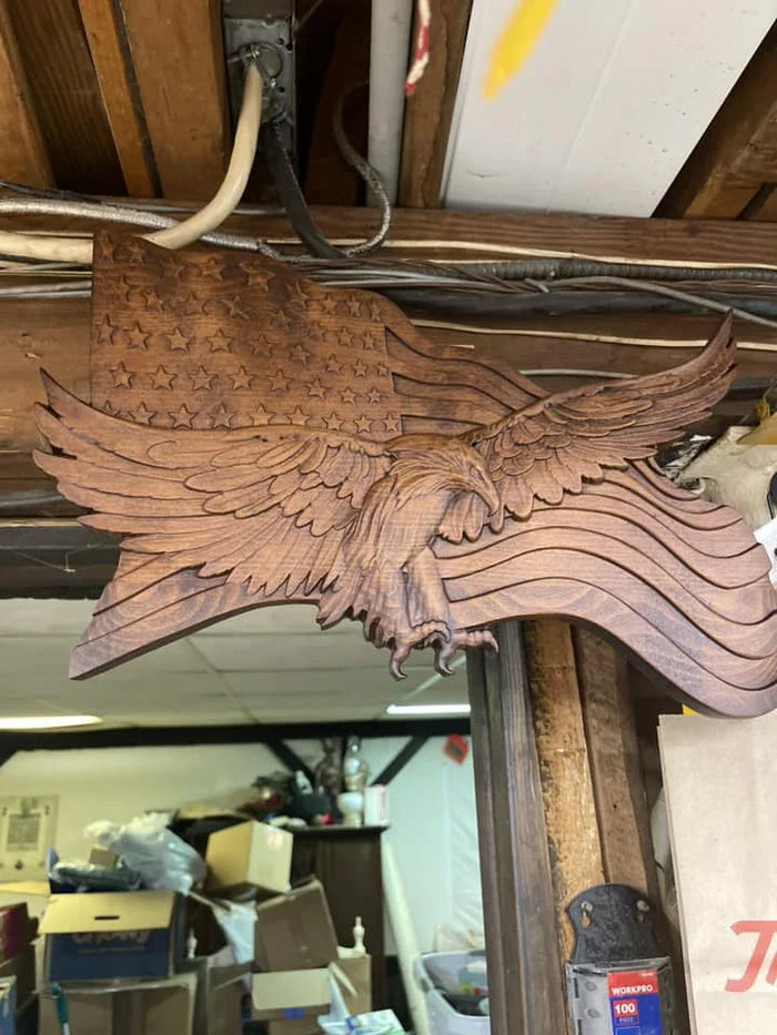 Wood carving detail with patriotic eagle and flag design