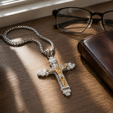 Titanium steel crucifix necklace close up with gold tone Christ figure