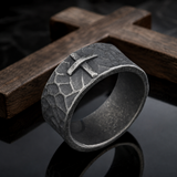 Hand-carved stone cross ring carries His gentle protection
