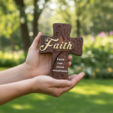 Hands presenting outdoors