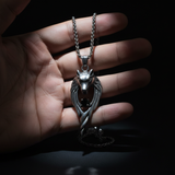 Polished silver hand holding spotlight