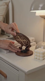 Black Walnut St. Benedict Cross Phone Stand—Foldable and Adjustable Christian Desktop Stand - product video preview 3