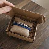 Two‑Layer Braided Leather Cross Bracelet - product video preview 10