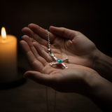 Two hands cradling - candlelight prayer